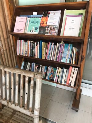 Bookshelf inside at Grow Vegan in Koh Samui
