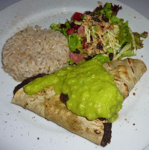 Falafel chalupas with guacamole, brown rice and salad. at VG-Tal in Bogota