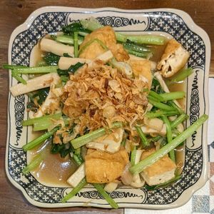 Vegan Stir-Fried Kale with Mushroom and Fried Tofu at Met Vietnamese Restaurant in Hanoi
