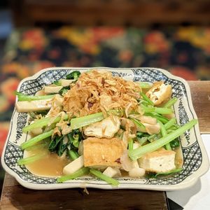 Vegan Stir-Fried Kale with Mushroom and Fried Tofu at Met Vietnamese Restaurant in Hanoi