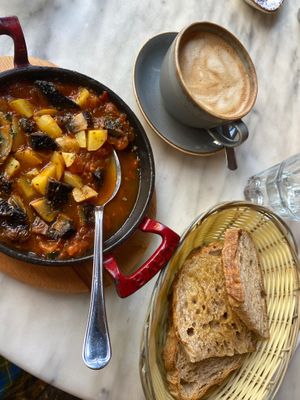Vegan shakshuka served with sourdough. Mocha with soya milk at Farm Kitchen in Southsea