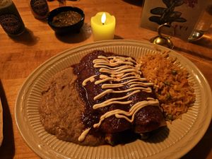 Vegan Enchiladas with red sauce, cheese and tempeh at Ranchos Cocina in San Diego