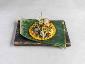 Taco Loco is one of our favourite dishes, it is a traditional open taco made with corn, topped with a jerk spiced banana blossom chilli, mango salsa &
chimichurri & chipotle mayo. at Cocoloco in Bournemouth