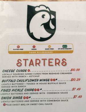 Menu clearly denotes vegan options   at Brew Bird in Fargo
