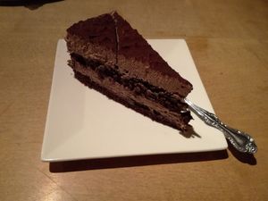 Vegan chocolate cake, big piece and delicious. at Hirschbachstueberl in Lenggries