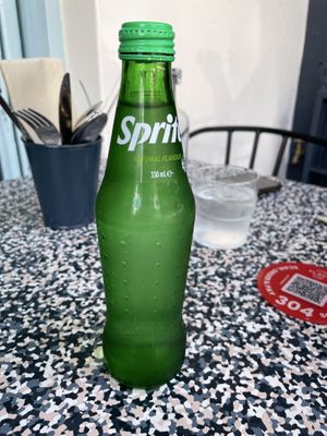Sprite in a glass bottle   at Flave in Darlinghurst