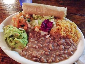 The non-sizzling half of the vegan fajitas with flour tortillas. at Pokez in San Diego