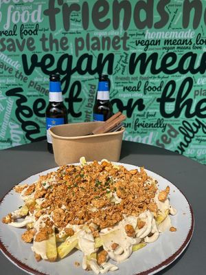 Patatas parmesanas at Rúkula Vegan Food in Malaga