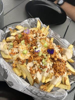Tofu cheese fries  at Rúkula Vegan Food in Malaga