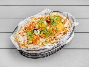 Tofu cheese fries at Rúkula Vegan Food in Malaga