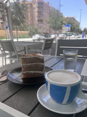 Lotus cookie cake & cappuccino   at Rúkula Vegan Food in Malaga