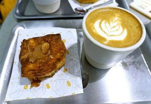 Flat White + Kouign-Amann at Buddy Buddy in Paris