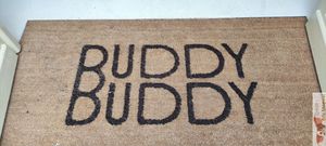 Entrance mat at Buddy Buddy in Paris