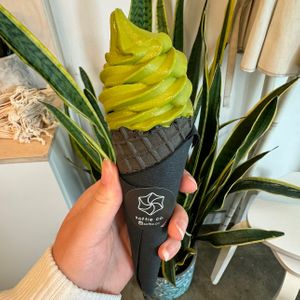 matcha soft serve in a cone   at Softie & Co in Vancouver