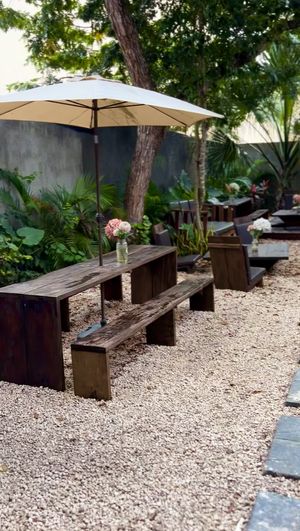 Outdoor seating area💚  at The Better Donut - temporarily closed in Tulum