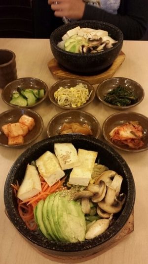 Veg appetizers & loaded eggless veg dol sot bibimbap. at Imonay Korean Restaurant in Toronto
