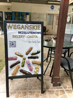 Scannable QR code on sign   at Eclair Lab in Warsaw