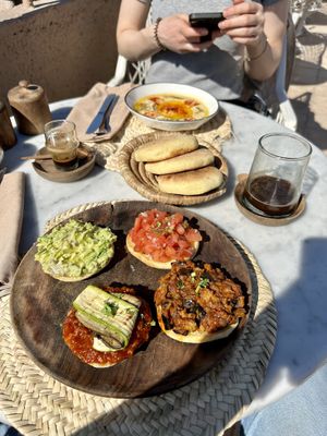 Hummus and vegan starters with bread  at Atay Cafe in Marrakech