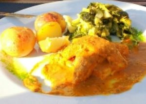 Tofu triangles with cardamom sauce. at Essencia in Porto