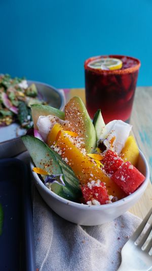 Cucumber Mango Jicama Melon Salad

Mix of cucumber, watermelon, jicama, canteloupe and mango. Served with a sweet coconut cream sauce, housemate tajin, almond cotija, and lime.  at Vegan Chula at 51 & Tel in Oakland