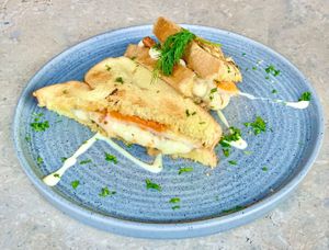 Melted cheese, bacon and eggs toastie. 100% Vegan.   at Beach Bowl Seminyak in Seminyak