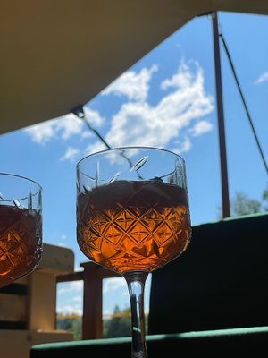 Evening Aperol Spritz on the terrace at Rex's Bar at ECO River Camp in Radovljica