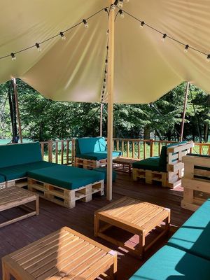 The terrace at Rex's Bar, overlooking the River Sava at Rex's Bar at ECO River Camp in Radovljica