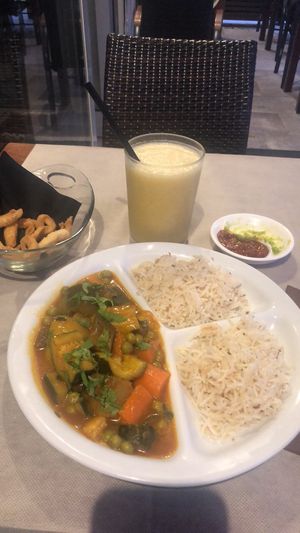 Vegetarian curry, vegan sweet lassi mango, snacks  at Buddha Soul in Venice