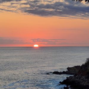 Sunset view from our table at Espadín in Puerto Escondido
