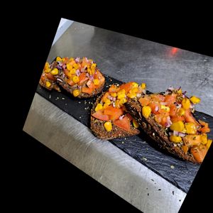 Vegan bruschetta made with homemade olive paste and veggies at Sweet Lounge Cafe & Restaurant in Armacao De Pera