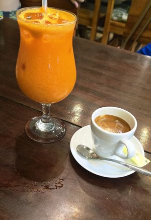 Carrot/ ginger juice and espresso at Tree House Cafe  in Phong Nha