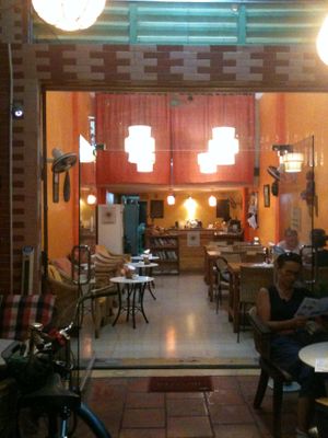 Inside the coffee, nice and cosy decoration, some books... at Cafe Soleil in Phnom Penh