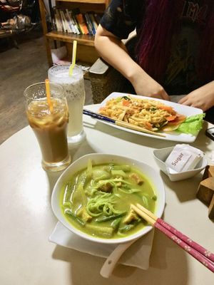 Curry with noodles and vegetarian noodles w/eggs and veggies  at Cafe Soleil in Phnom Penh