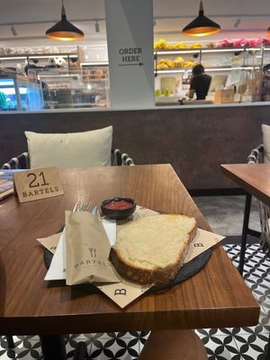 Vegan cheese on slice of sourdough with strawberry jam    at Bartels in Bangkok