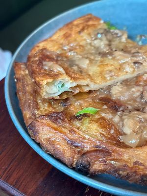 Spring onion pancakes  at Uncle Wang in Brisbane