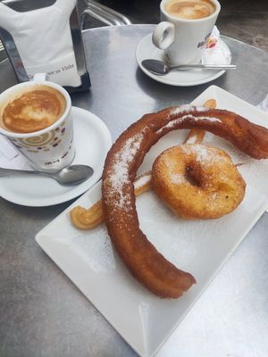 Soya coffee, churros and donut at Buñoleria Churreria El Contraste in Valencia