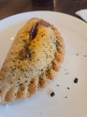 Meatball hand pie 🍕 at Seawall Coffee Company in Galveston