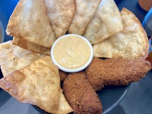 Avocado fries with some kind of crispy bread   at Veg Stop in Riga