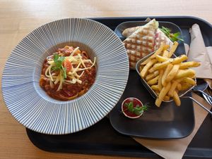 The Pasta Bolognese and Chick'n Wrap with Fries at Veg Stop in Riga