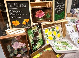 Hand painted serving trays for sale at Hella Plants Market in Oakland