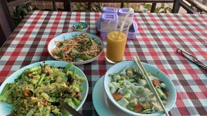Noddle soup, fried rice curry, papaya salad, mango shake (if I’m remembering them correctly)  at On's Thai Isaan in Kanchanaburi