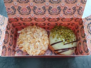 Bienenstich and Mozartkugel donuts are with filling and were both tasty at Brammibal's Donuts - Jungfernstieg in Hamburg