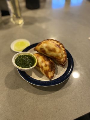 argentinian (plant-based) meat (V)
plant-based meat in a traditional Argentinian seasoning of onions, garlic, red pepper & homemade chimichurri sauce!!  at Masa Empanadas in Portland