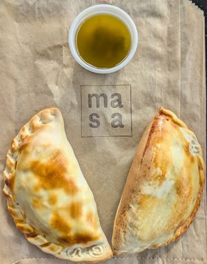 empanadas and chimichurri at Masa Empanadas in Portland