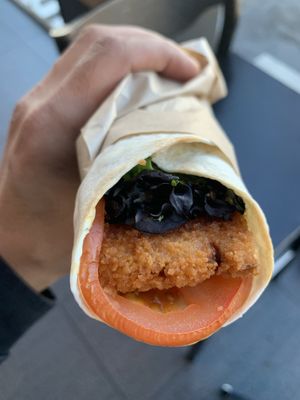 Plant based schnitzel wrap. Small an pricey but not bad    at SYD - Soul Origin - T2  in Mascot