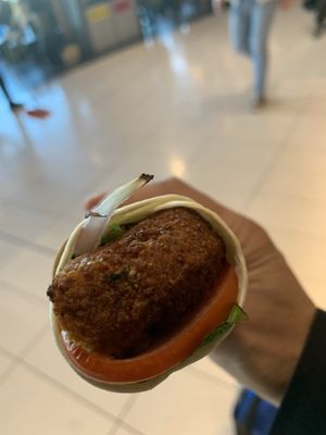 Falafel wrap. Pretty tasty but pricey    at SYD - Soul Origin - T2  in Mascot