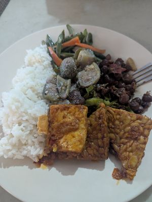 All this cost about 30k, however most of it cold/just warm. Spicy tofu and tempe in picture. at Warung Rezeki in 