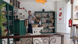 Looking up to the front counter and wall at Grumpy Mamas in Monchique