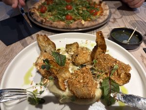 Celery nuggets and Pizza with vegan cheese    at Wena Restaurant in Swinoujscie