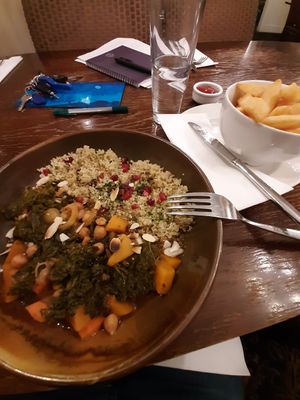 Vegan chickpea tagine with quinoa, pomegranate, and toasted almonds (and chips!) at Dog & Bear Hotel in Maidstone